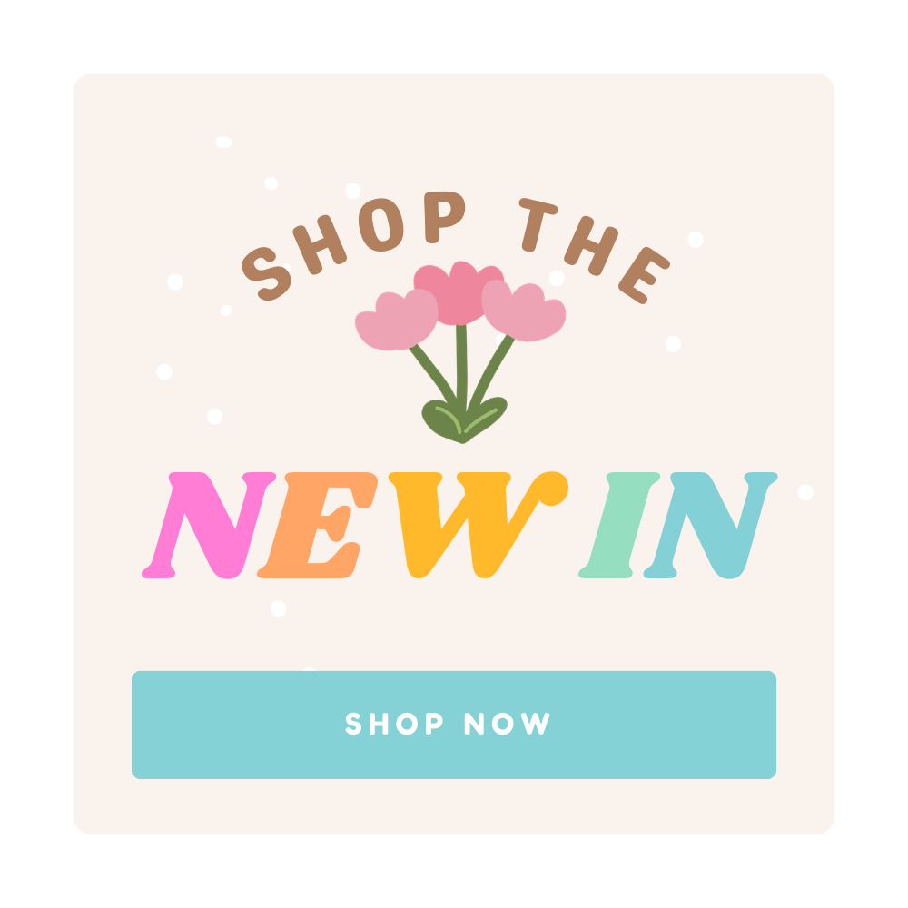 "Colorful graphic with text 'Shop the New In' featuring pink flowers above. Pastel hues and playful font create a cheerful, inviting tone. 'Shop Now' button below."